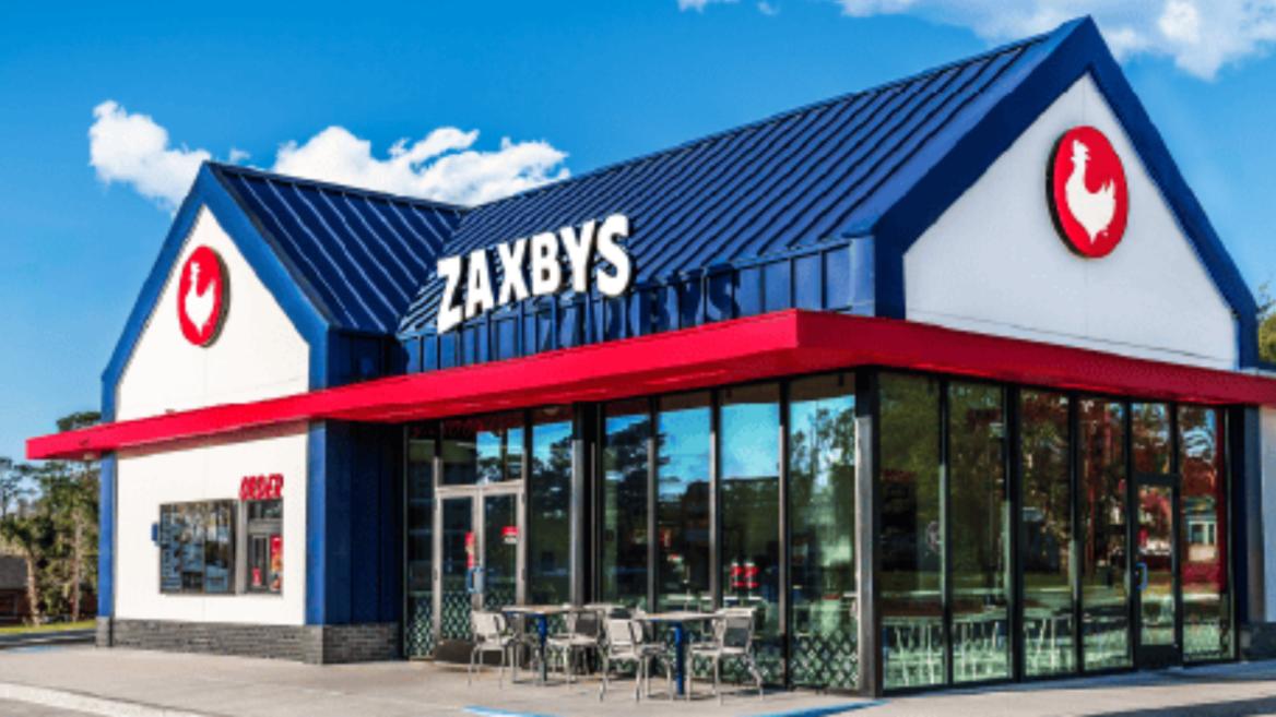 zaxbys restaurant exterior with blue roof and patio