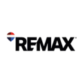 logotipo remax con emblema circular rojo y azul