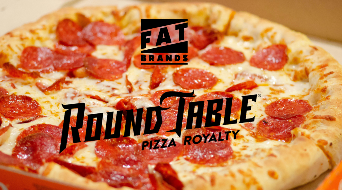 round table pepperoni pizza close up