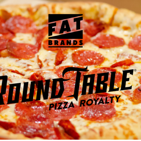 round table pepperoni pizza close up