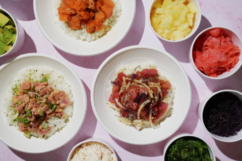 colorful poke bowls with tuna, salmon & avocado