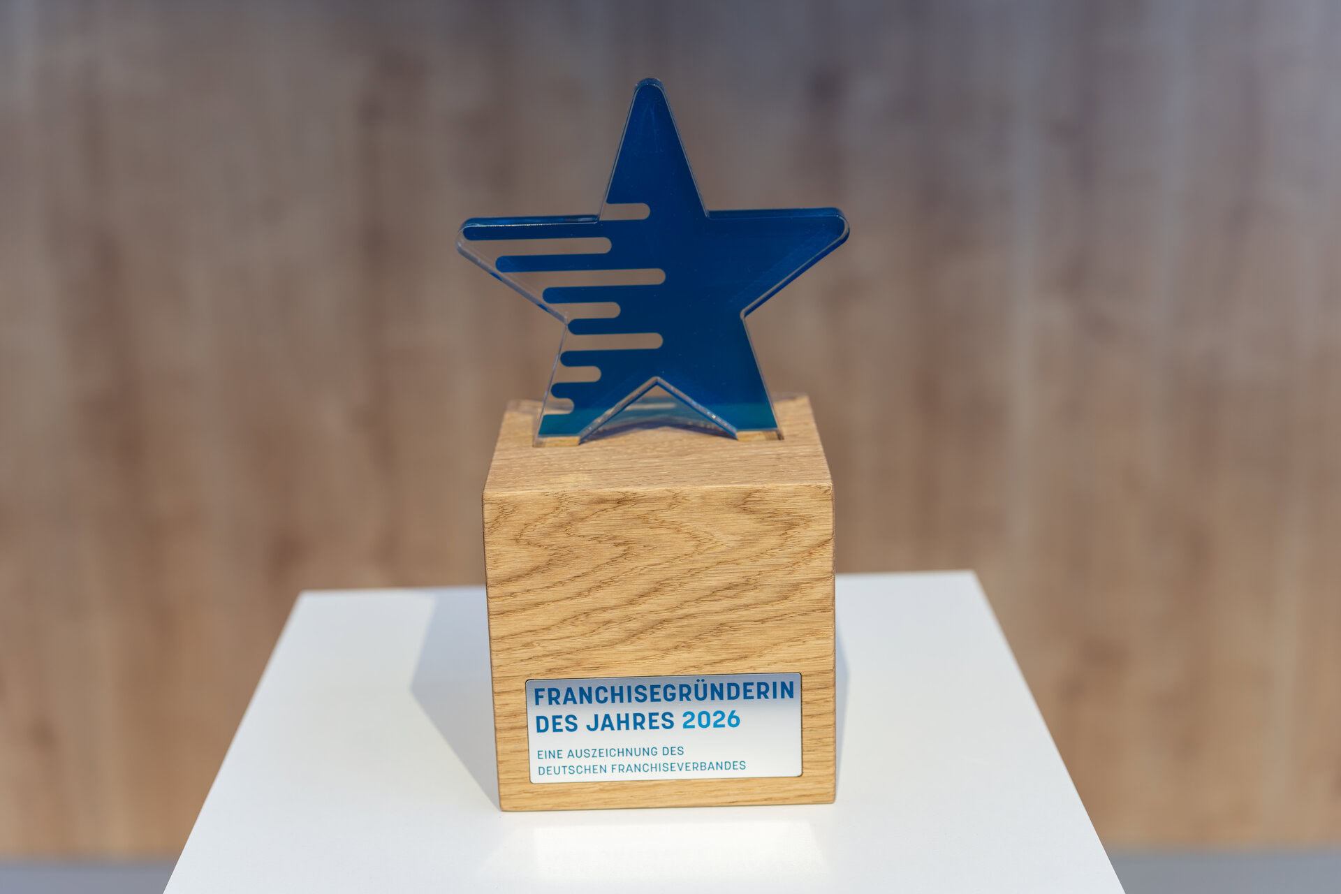 franchisegründerin des jahres 2026 – blauer acrylstern