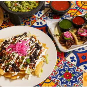 qdoba nachos, steak tacos and guacamole feast