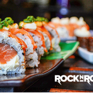fresh salmon sushi roll close up with sesame