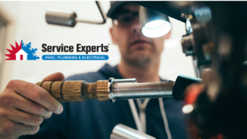 service experts technician repairing hvac, plumbing & electrical