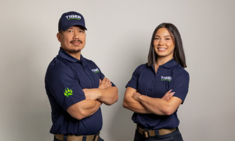 tiger team staff portrait in navy uniforms