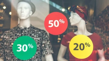 vitrine soldes : mannequins et pastilles 50% 30% 20%