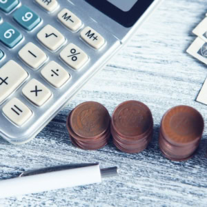 calcolatrice, monete e gestione del risparmio