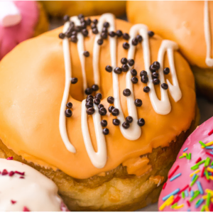vibrant glazed donut assortment with orange center