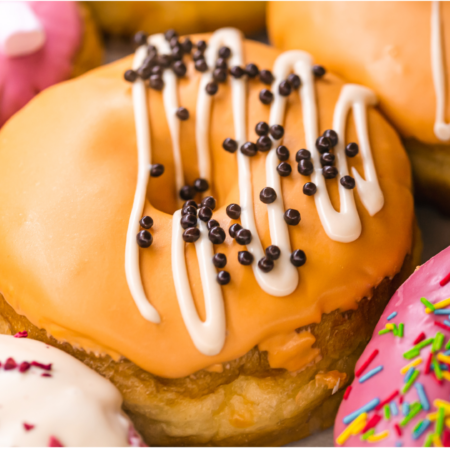vibrant glazed donut assortment with orange center