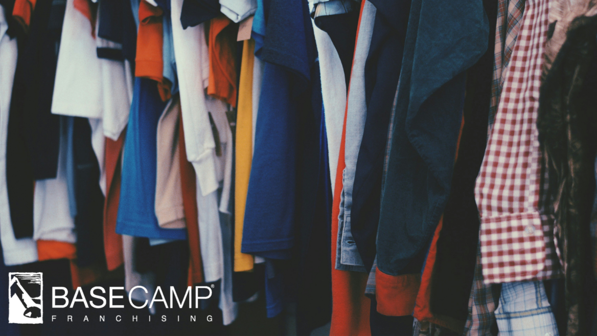 assorted shirts and jackets on clothing rack