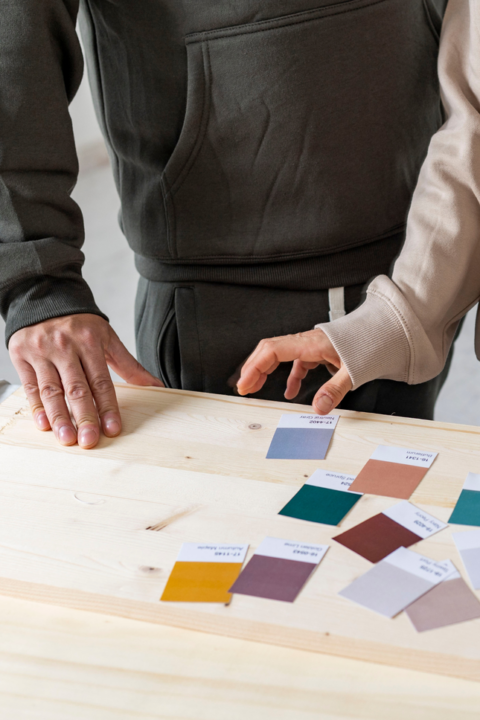 collaborating over color swatches and fabric samples