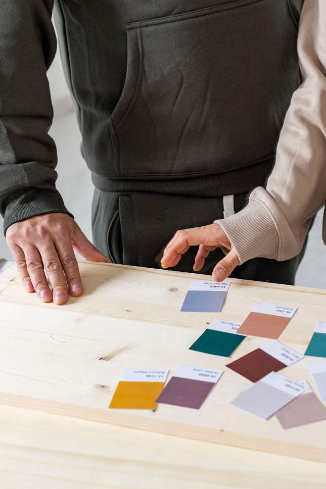 collaborating over color swatches and fabric samples