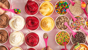 colorful dessert topping station with pink spoons