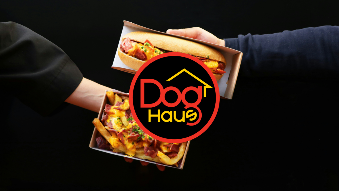 dog haus sausage sandwich with loaded cheese fries