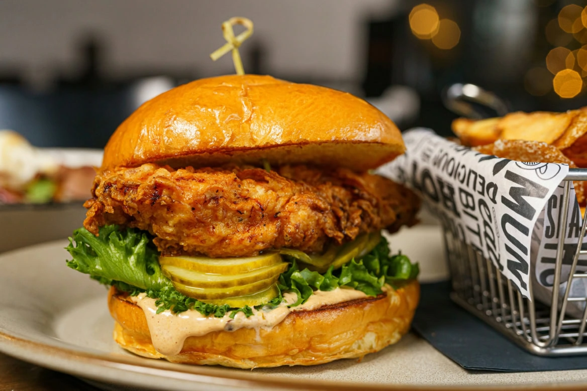 crispy fried chicken sandwich with seasoned fries
