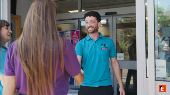 friendly staff greeting at the entrance