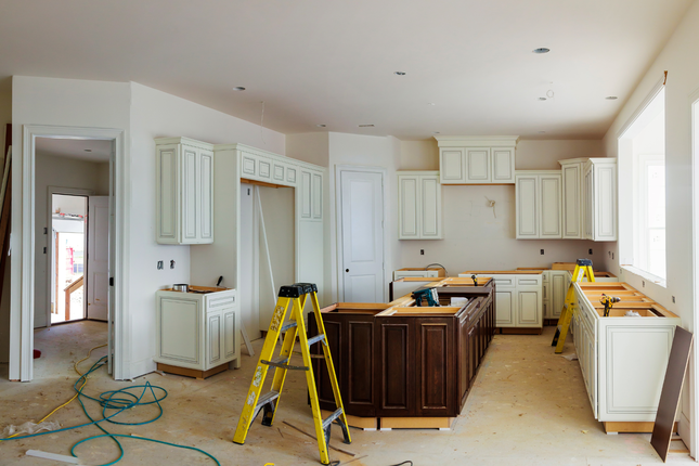 mid renovation kitchen with dark island