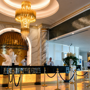 luxury hotel lobby with marble and chandelier