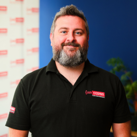 bearded man in branded polo portrait