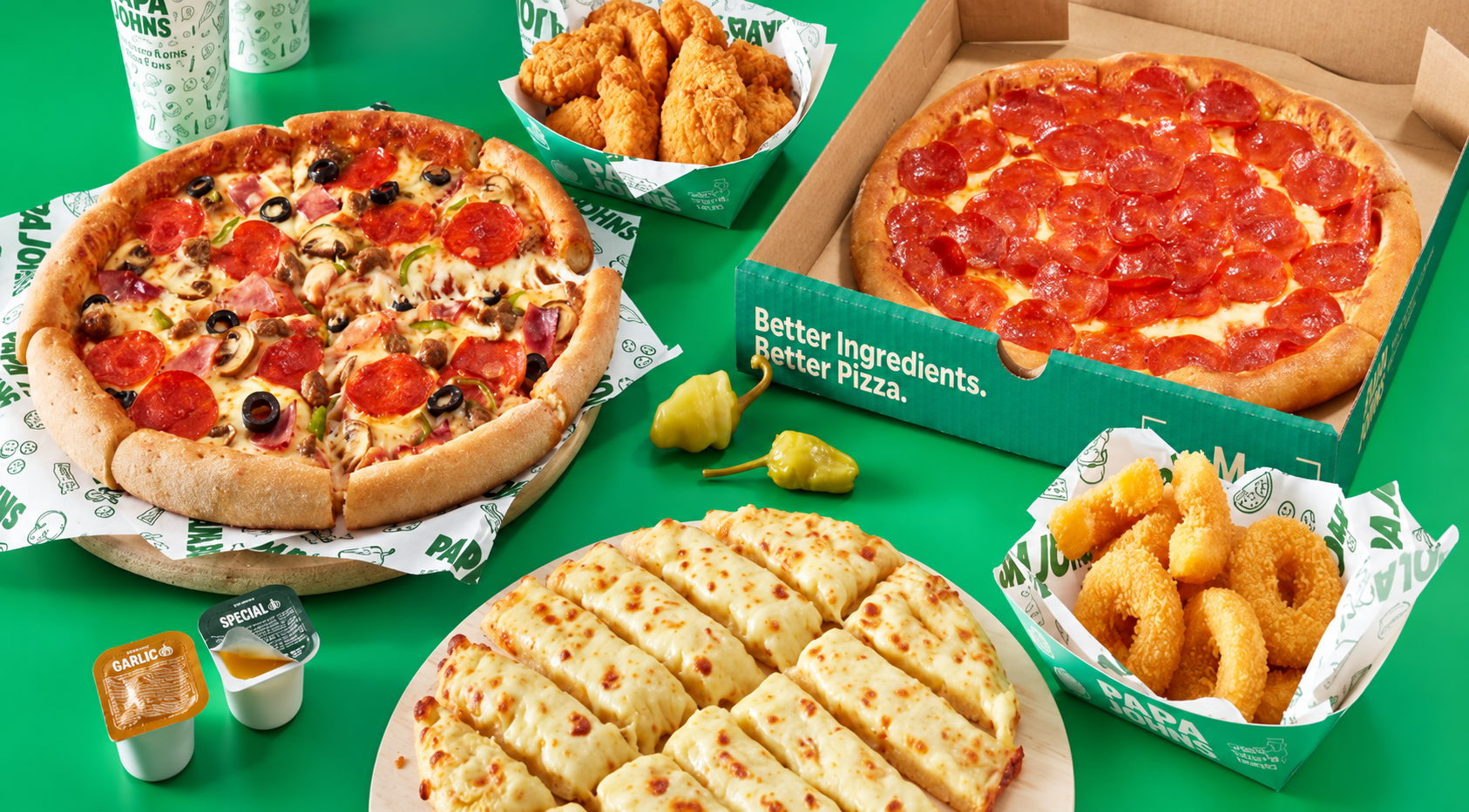 surtido papa john’s de pizza y pollo frito
