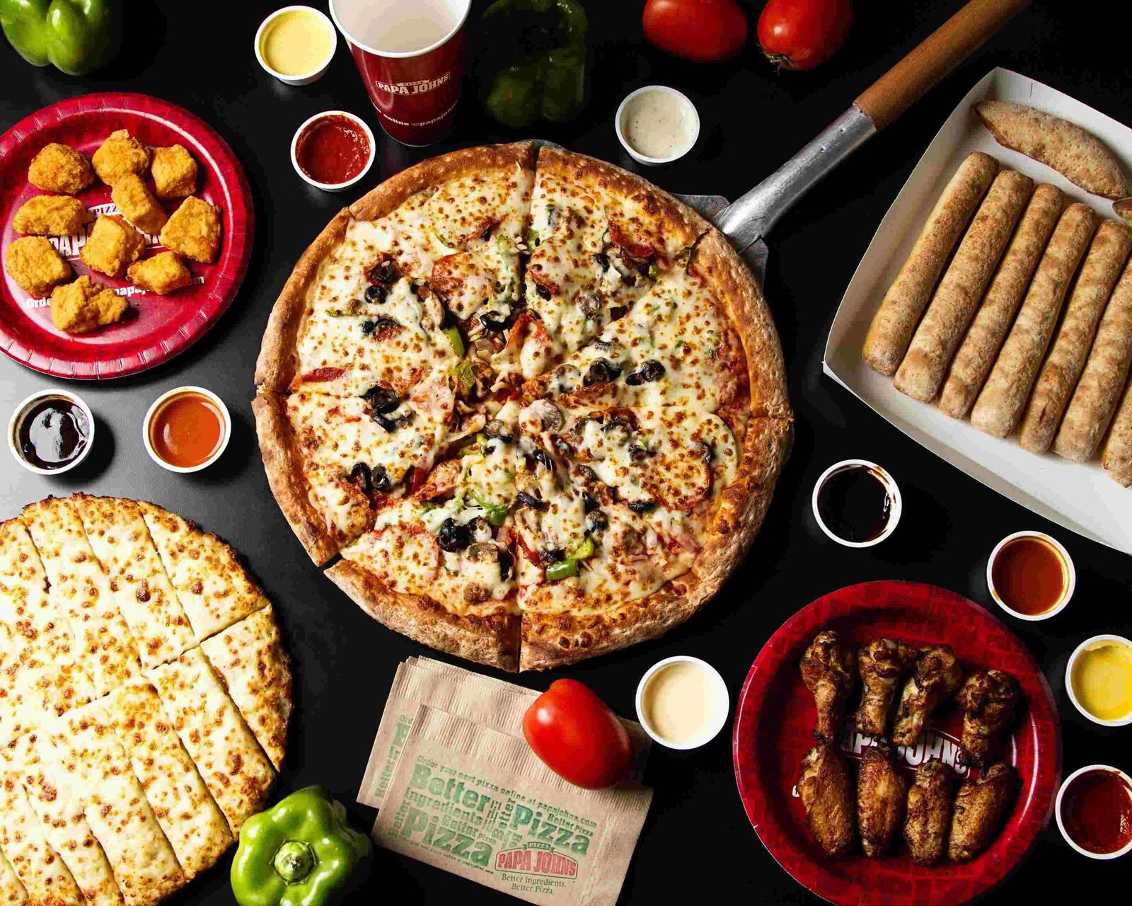 pizza papa john’s con salsas y acompañamientos