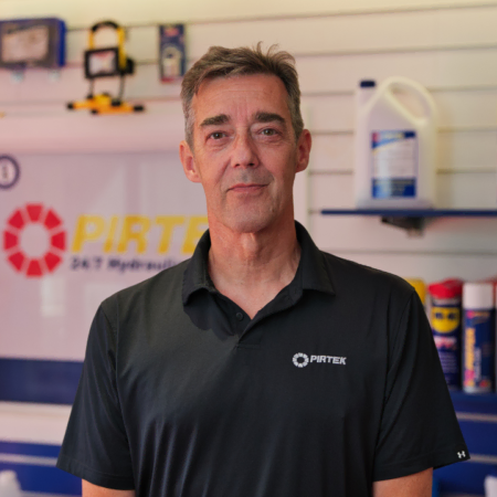 pirtek service counter staff portrait in shop