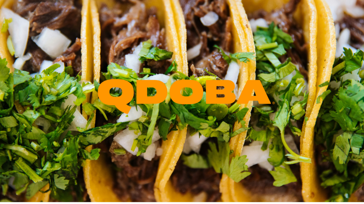 qdoba corn tacos with shredded meat and cilantro