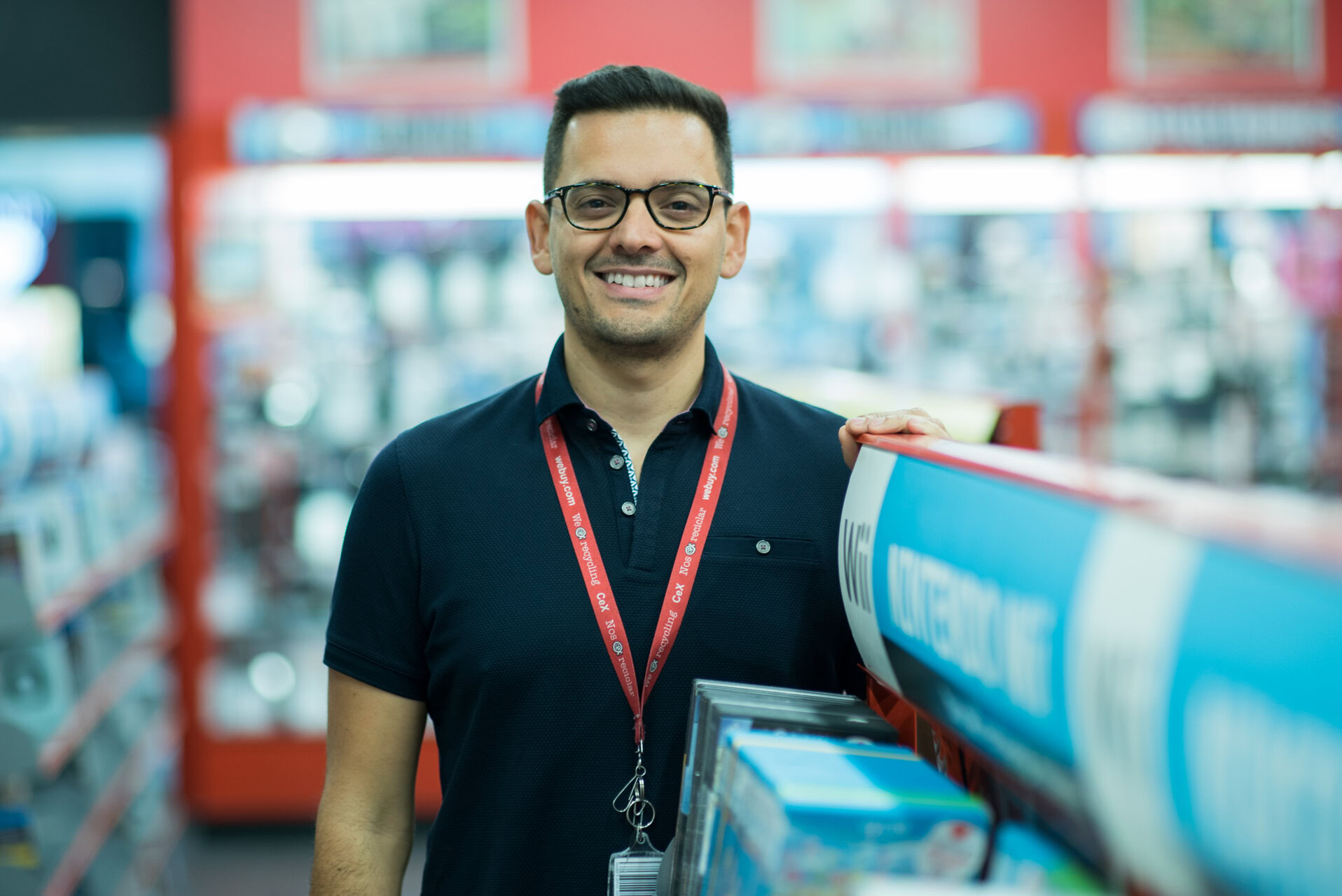 smiling exhibitor at retail trade show booth