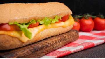 melted cheese sub with fresh lettuce and tomato