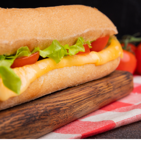 melted cheese sub with fresh lettuce and tomato