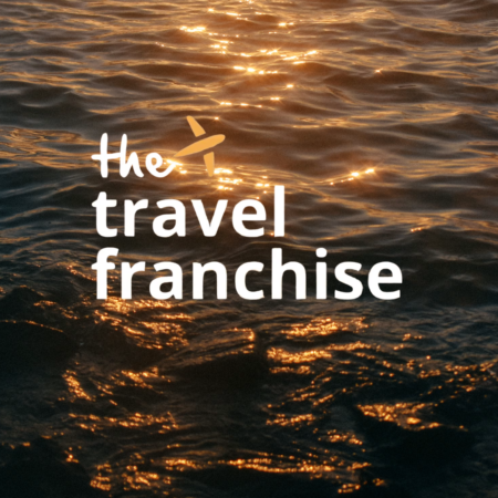 travel franchise logo on golden hour sea