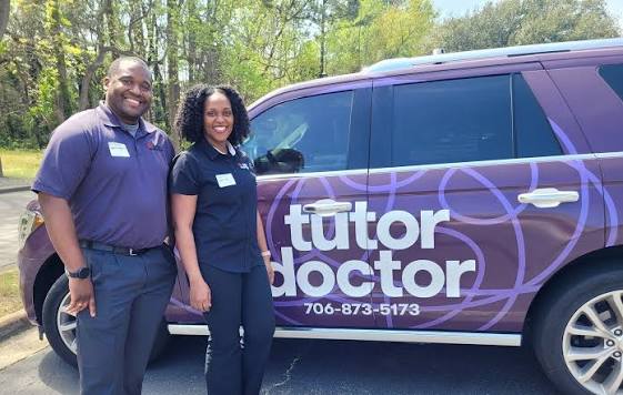 tutor doctor local tutors beside branded purple suv