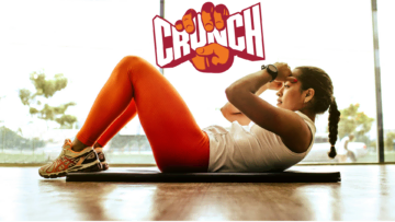 core crunch workout: woman in orange leggings