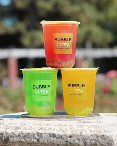 colorful bubble tea cups outdoors