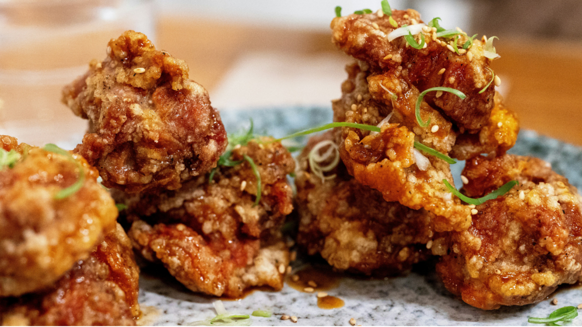 glazed crispy fried chicken with sesame and scallions