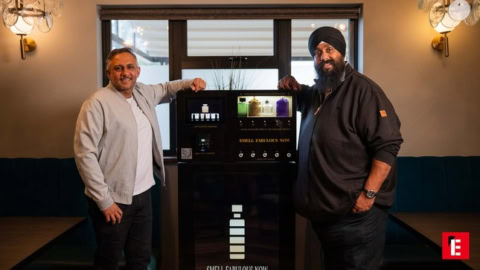 fragrance dispenser display with two men