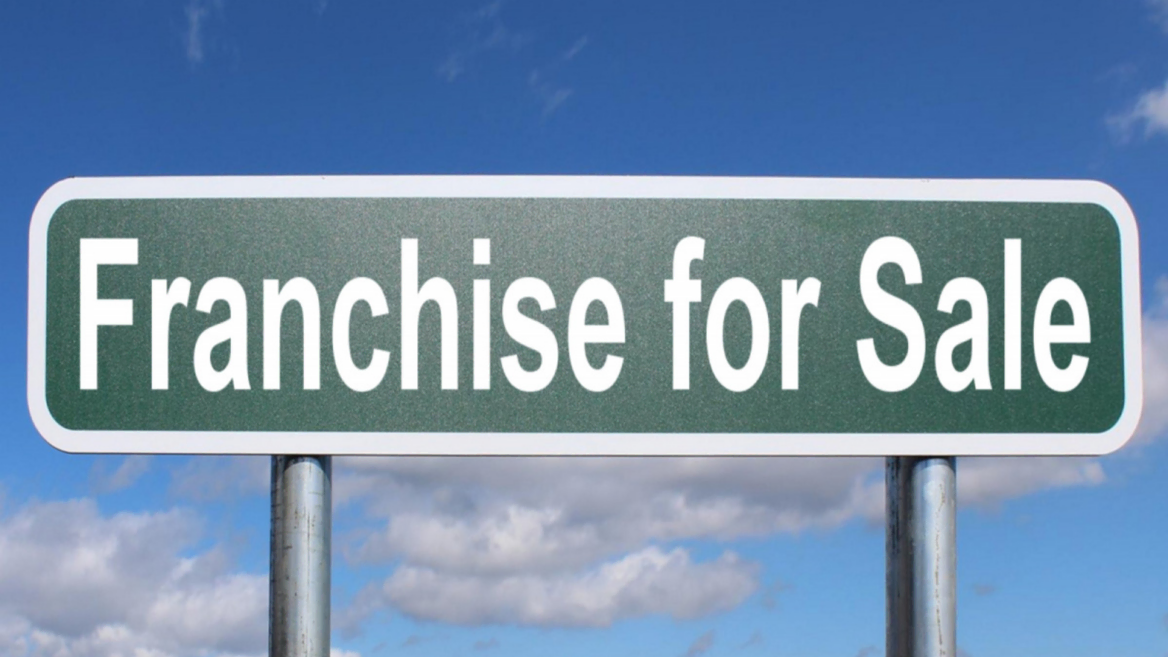 franchise for sale road sign