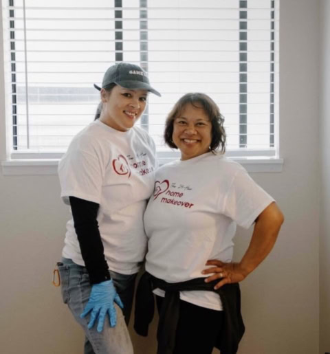 smiling home makeover volunteers indoors