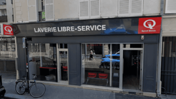 façade de laverie speed queen avec vélo
