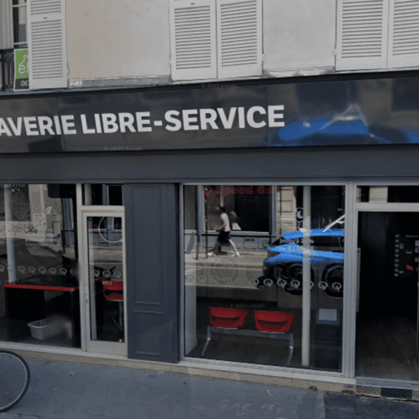 façade de laverie speed queen avec vélo