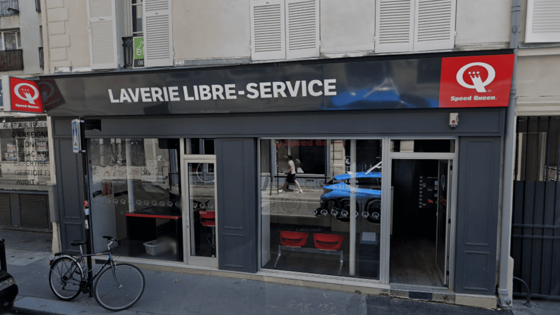 façade de laverie speed queen avec vélo
