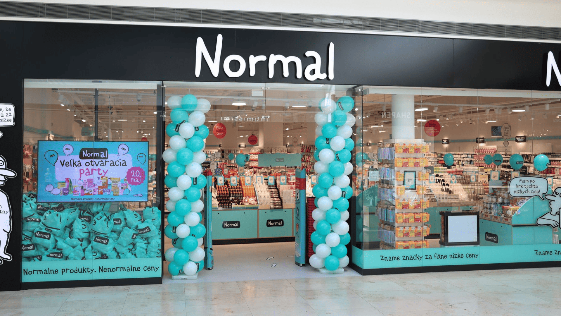 inauguración de la tienda normal con globos