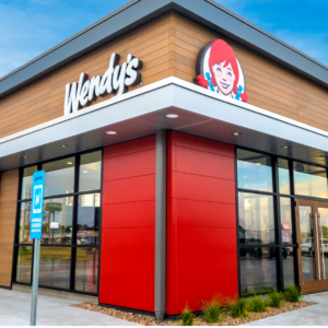 modern wendy’s restaurant exterior with drive thru parking