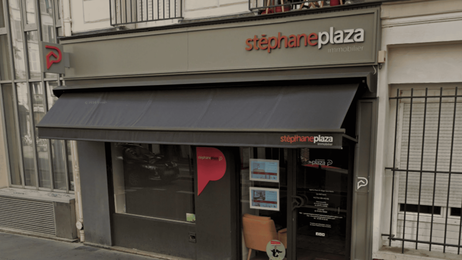 façade d’agence immobilière stéphane plaza en ville