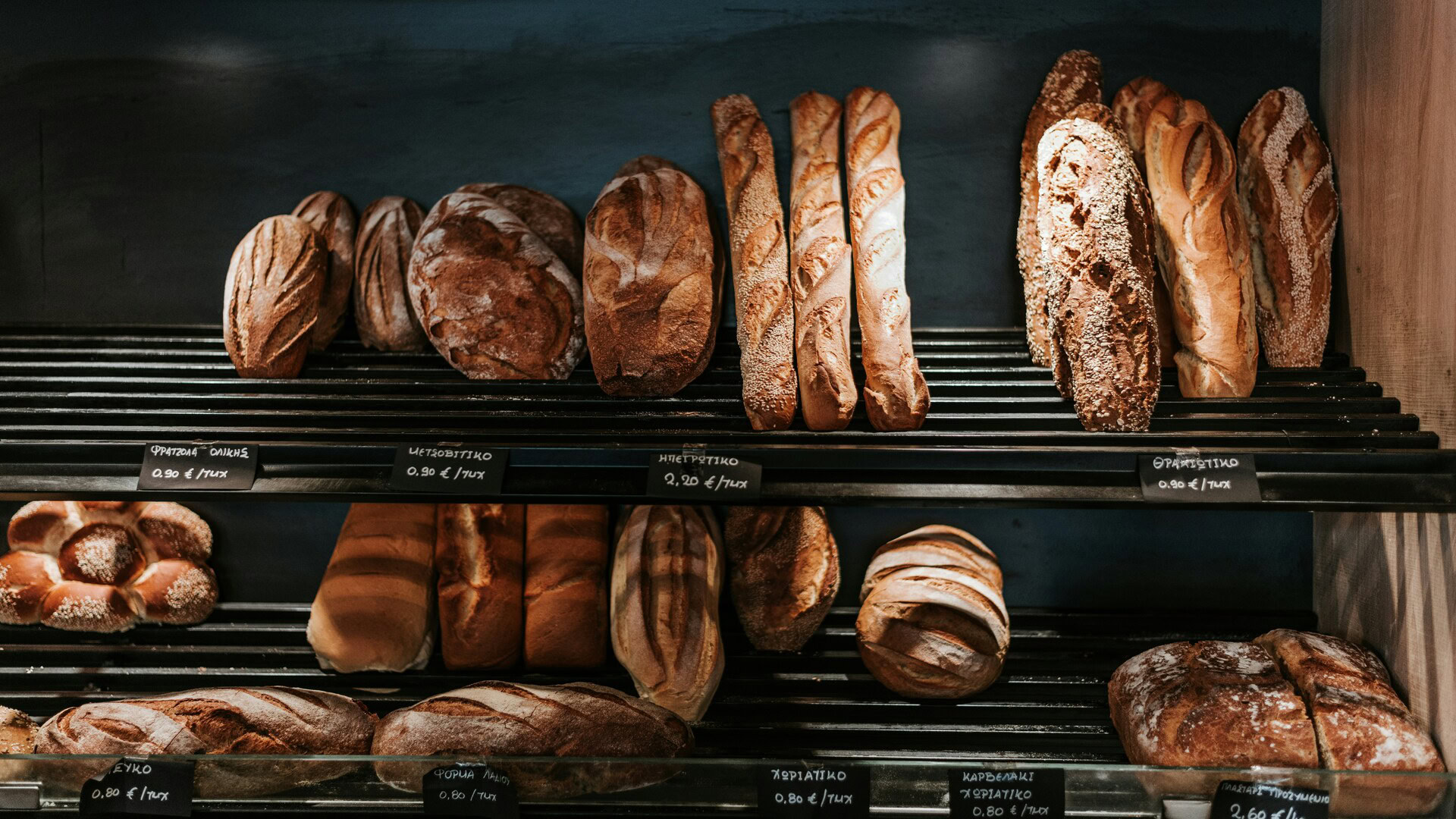 artisan bread display on bakery shelves