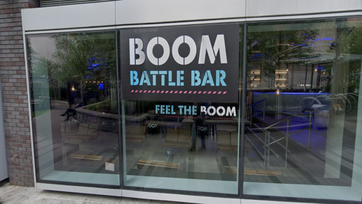 boom battle bar storefront, neon gaming venue