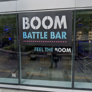 boom battle bar storefront, neon gaming venue