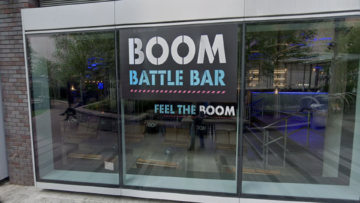 boom battle bar storefront, neon gaming venue