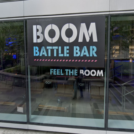 boom battle bar storefront, neon gaming venue